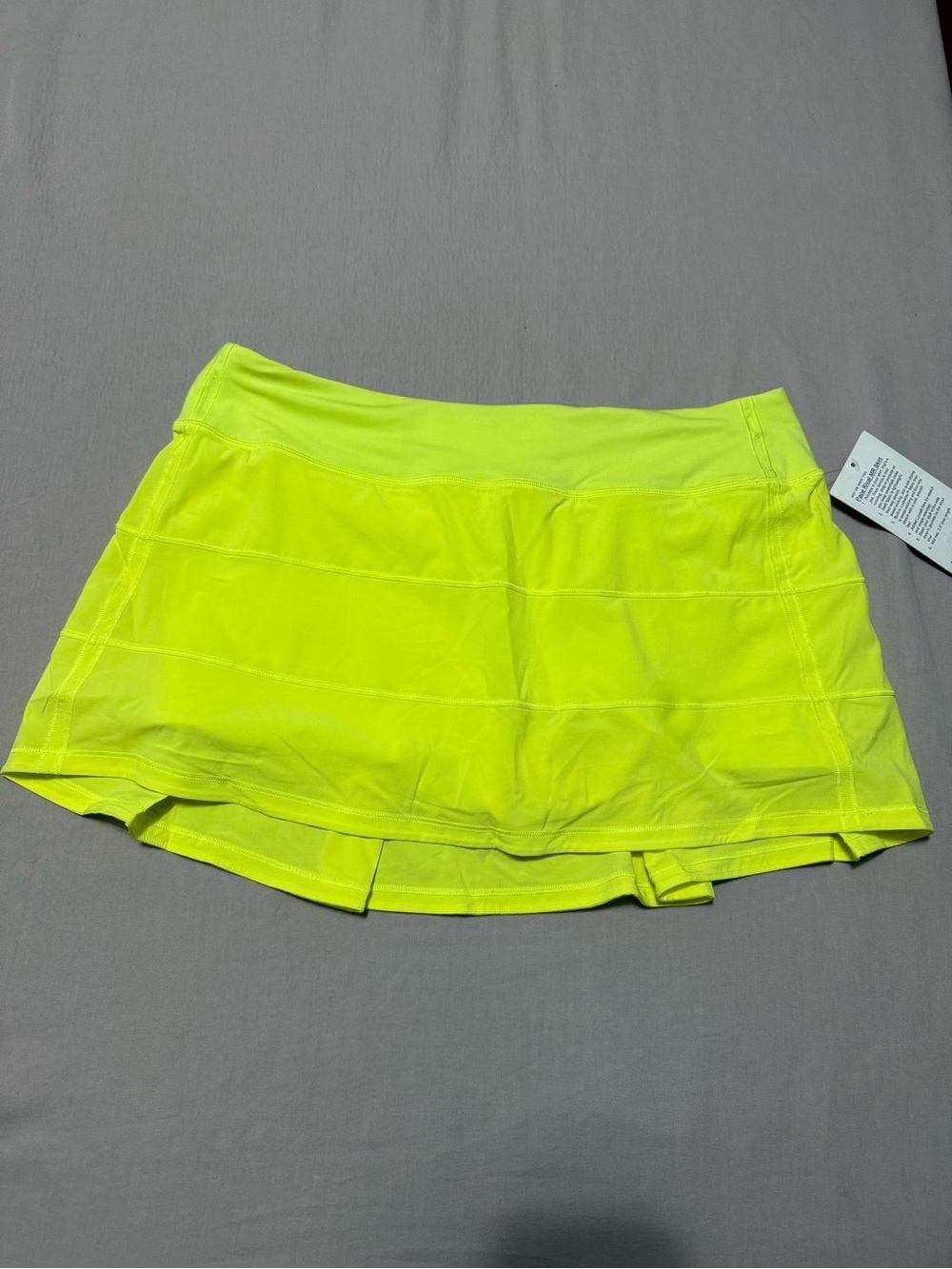 Lululemon Pace Rival MR Skirt, neon yellow.  Size 12.  NEW WITH TAGS